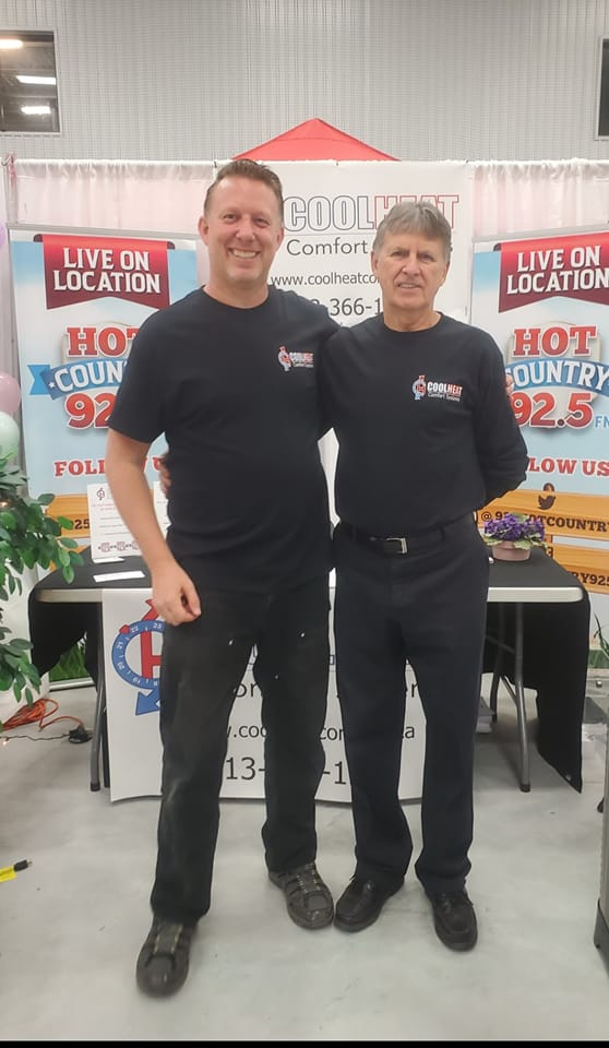 A photograph of Ray Richer, president of CoolHeat Comfort Systems with father Raymond at the 2023 Clarence-Rockland Expo. 